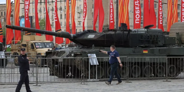 Putin boldly showcases captured American and British tanks in Moscow.