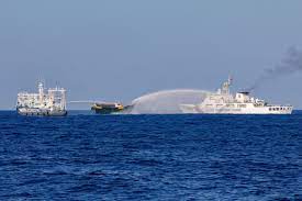 China escalates tensions in the South China Sea by deploying water cannons against Philippine vessels in the vicinity of Scarborough Shoal.