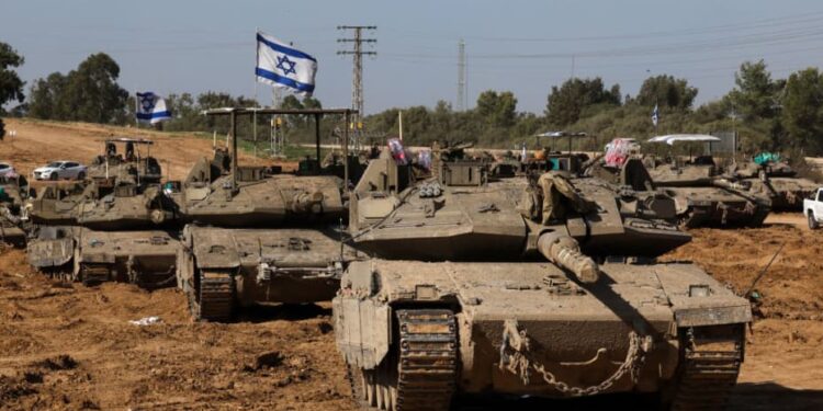 Israeli troops enter Gaza from the north and south, compelling Palestinians to evacuate their camps.
