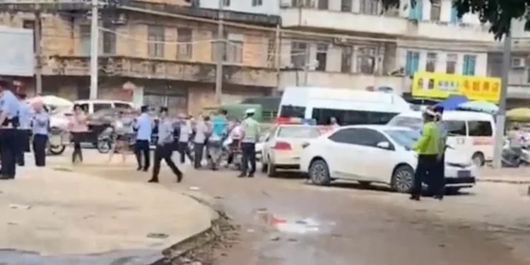 Two people were killed and more than 20 others were injured in a knife attack at a hospital in China, with the suspect being taken into custody.
