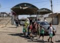 Israeli forces seize control of the Rafah crossing on the Gaza side, in a move to tighten their grip on the area.