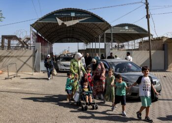 Israeli forces seize control of the Rafah crossing on the Gaza side, in a move to tighten their grip on the area.