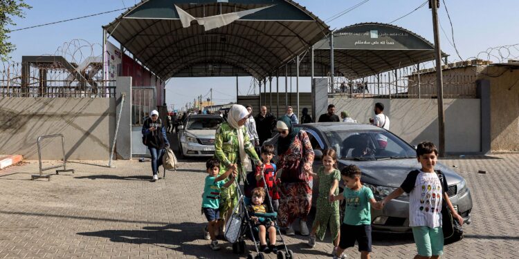 Israeli forces seize control of the Rafah crossing on the Gaza side, in a move to tighten their grip on the area.