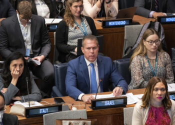 Israel condemns the United Nations resolution endorsing the rights of Palestinians and tears apart a duplicate of the charter.