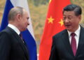 During his visit to Beijing, Xi Jinping promises to enhance China-Russia relations.