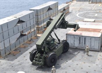 U.S. assistance to Gaza experiences delays due to the temporary removal of a military pier from the coastline for maintenance purposes.