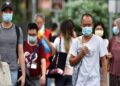 Singapore prepares for a surge in Covid-19 cases as it braces itself for the impact.