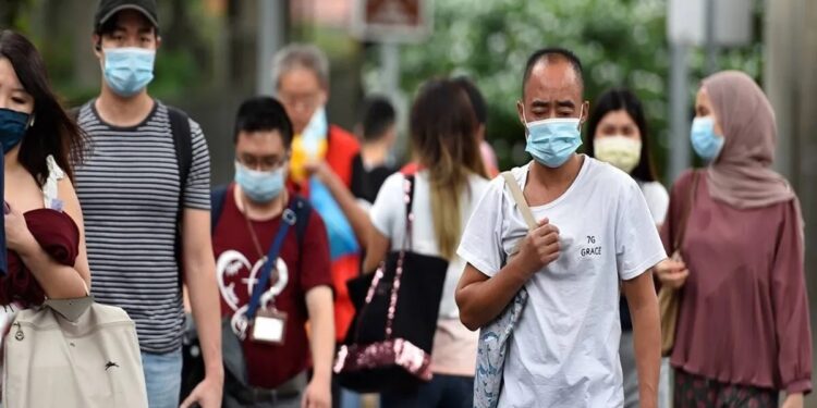 Singapore prepares for a surge in Covid-19 cases as it braces itself for the impact.