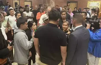 A 13-year-old was shot by a US police officer while on the ground, as he was carrying a replica handgun.