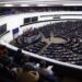 What is at risk in the European Parliament election that ends on Sunday?