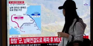 North Korea detonates roads close to the border with South Korea following a warning to sever all connections.