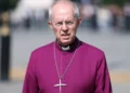 What is the UK abuse scandal that resulted in the resignation of the Church of England’s leader?