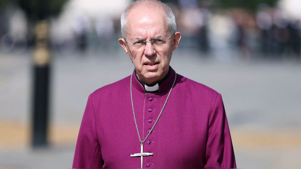 What is the UK abuse scandal that resulted in the resignation of the Church of England’s leader?