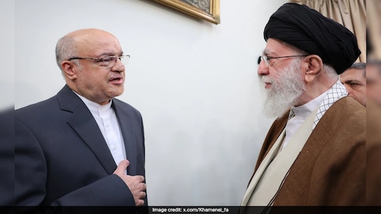Reports suggest that the Iranian leader is in a coma, but his office has released a photo of him meeting with an envoy.