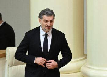 Georgia faces turmoil as a hardline president takes office, sparking protests and a political dispute.