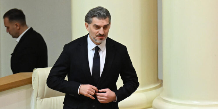 Georgia faces turmoil as a hardline president takes office, sparking protests and a political dispute.