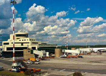 Passengers are stranded in Italy due to strikes and a fire that have disrupted flight and train services.