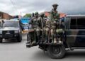 Congo reports that rebels supported by Rwanda have killed 80 civilians during peace negotiations.