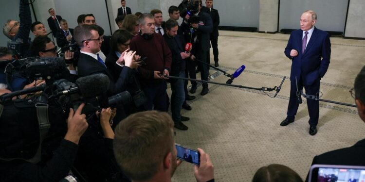 Putin describes the new US oil sanctions as an ‘unfriendly act’ and claims they will not impact the Russian economy.